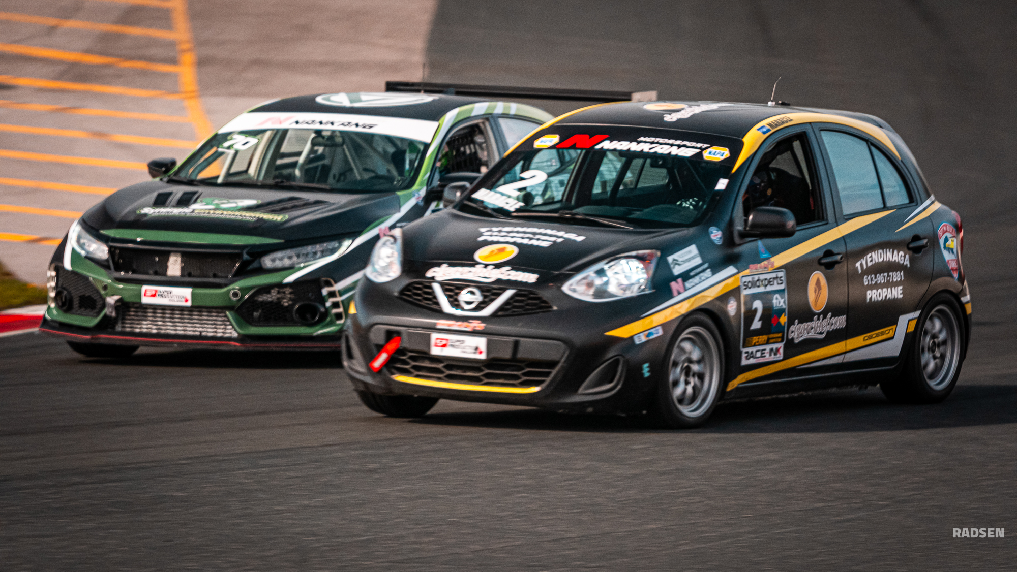 Side by side racing action